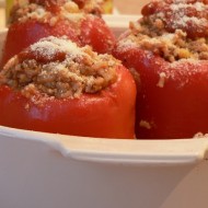stuffed peppers going into the oven